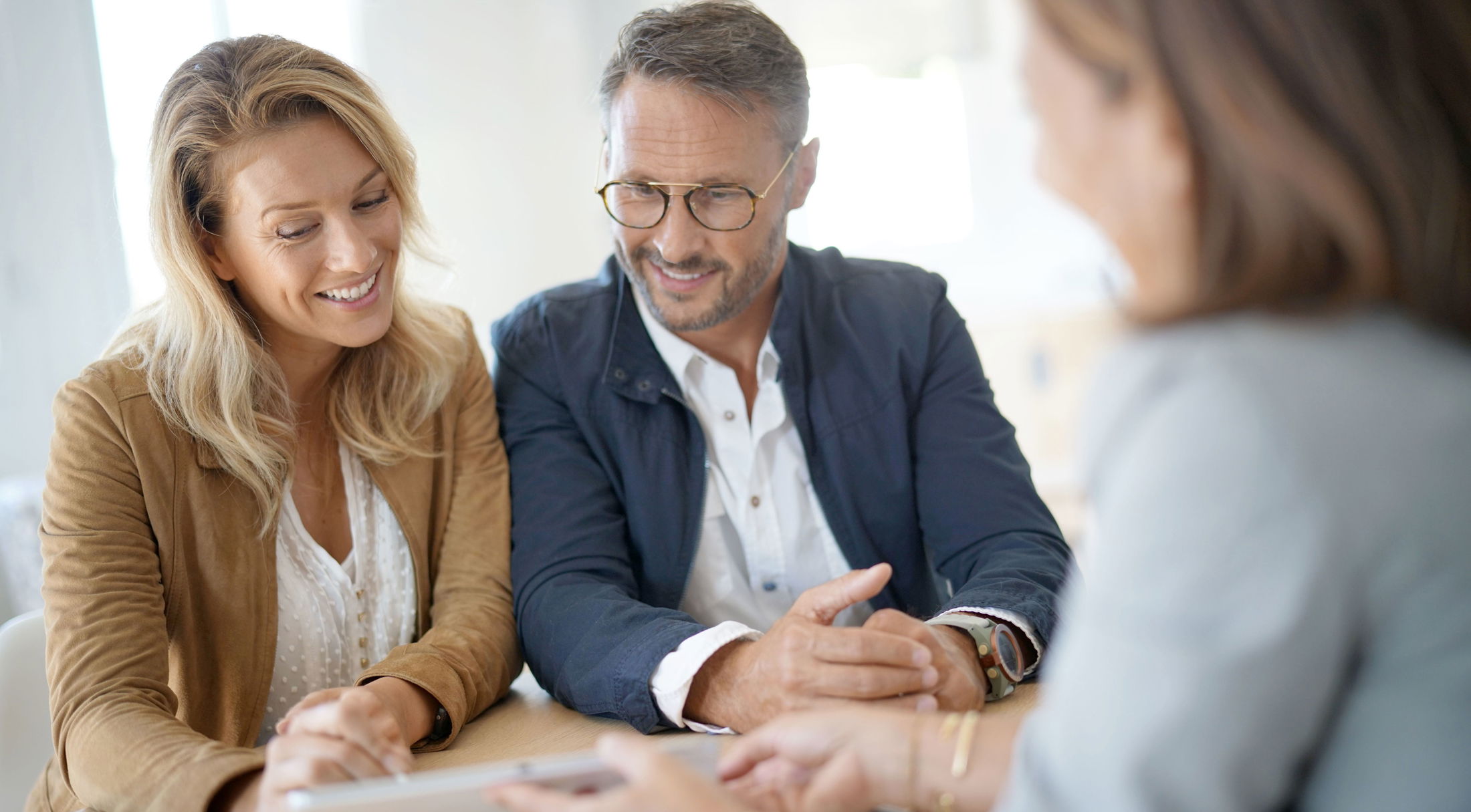 a couple closing on their new home in butler