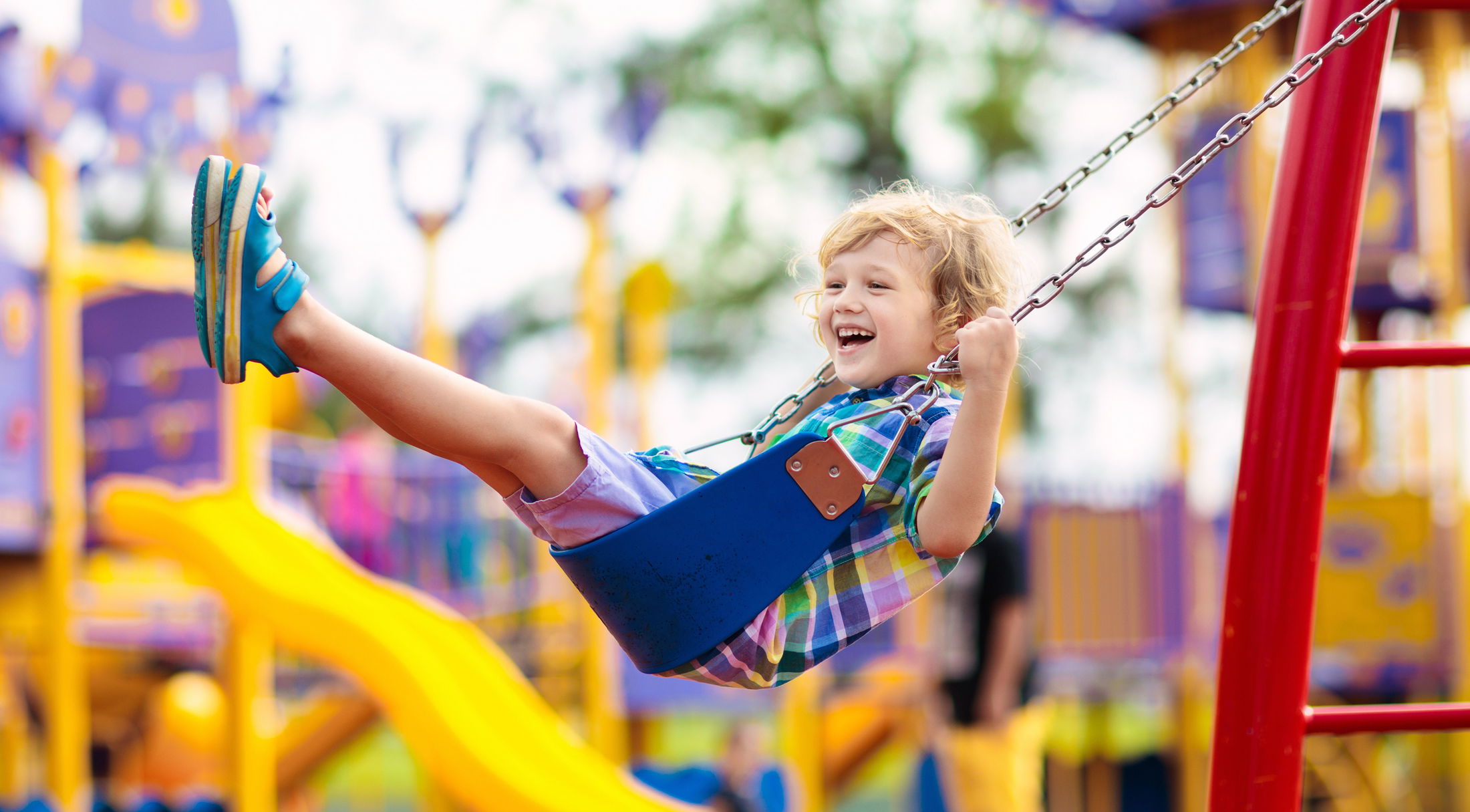 a child on a swing in a park in butler county, pa