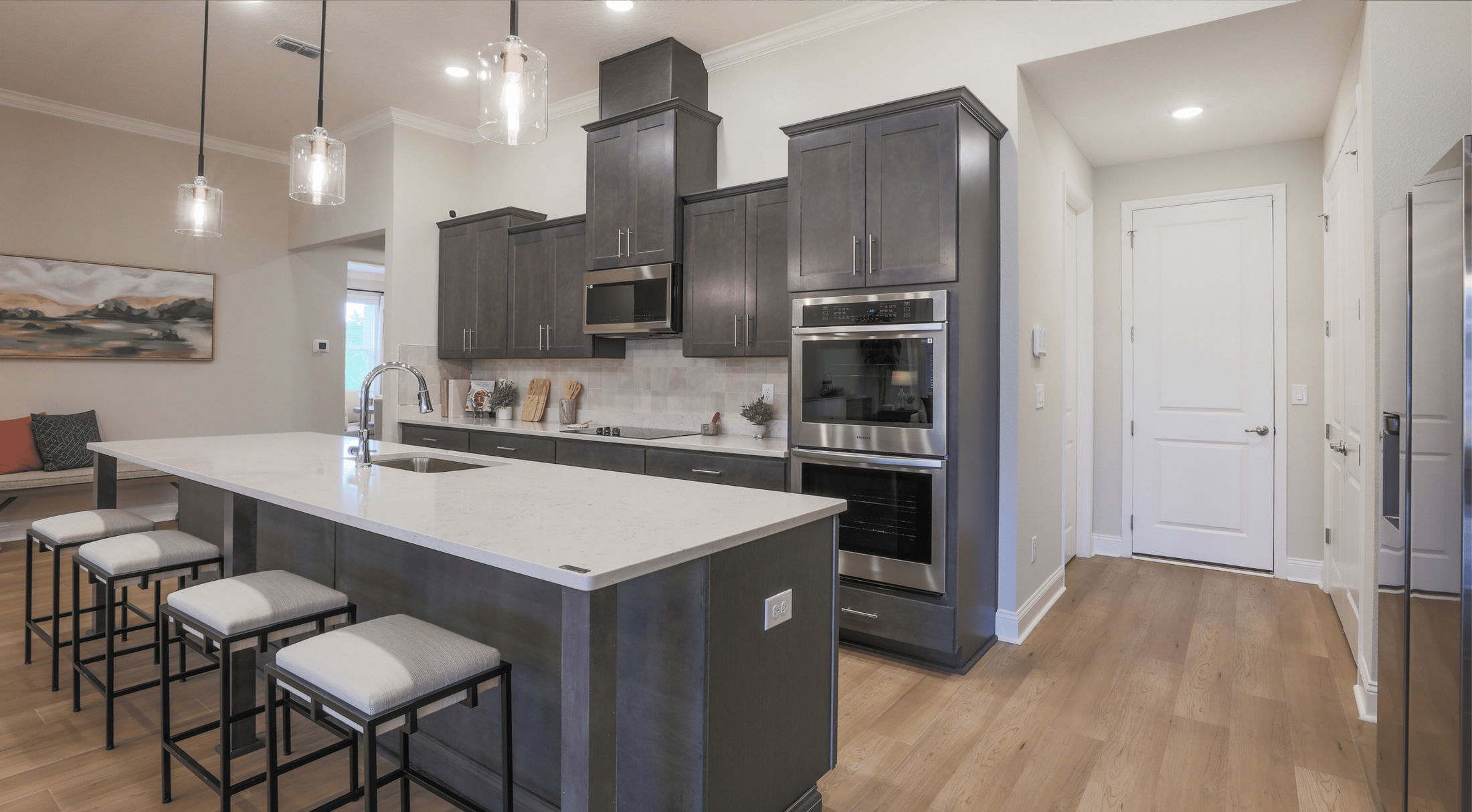 wood cabinets and stainless appliances in a new home in grant-valkaria, fl