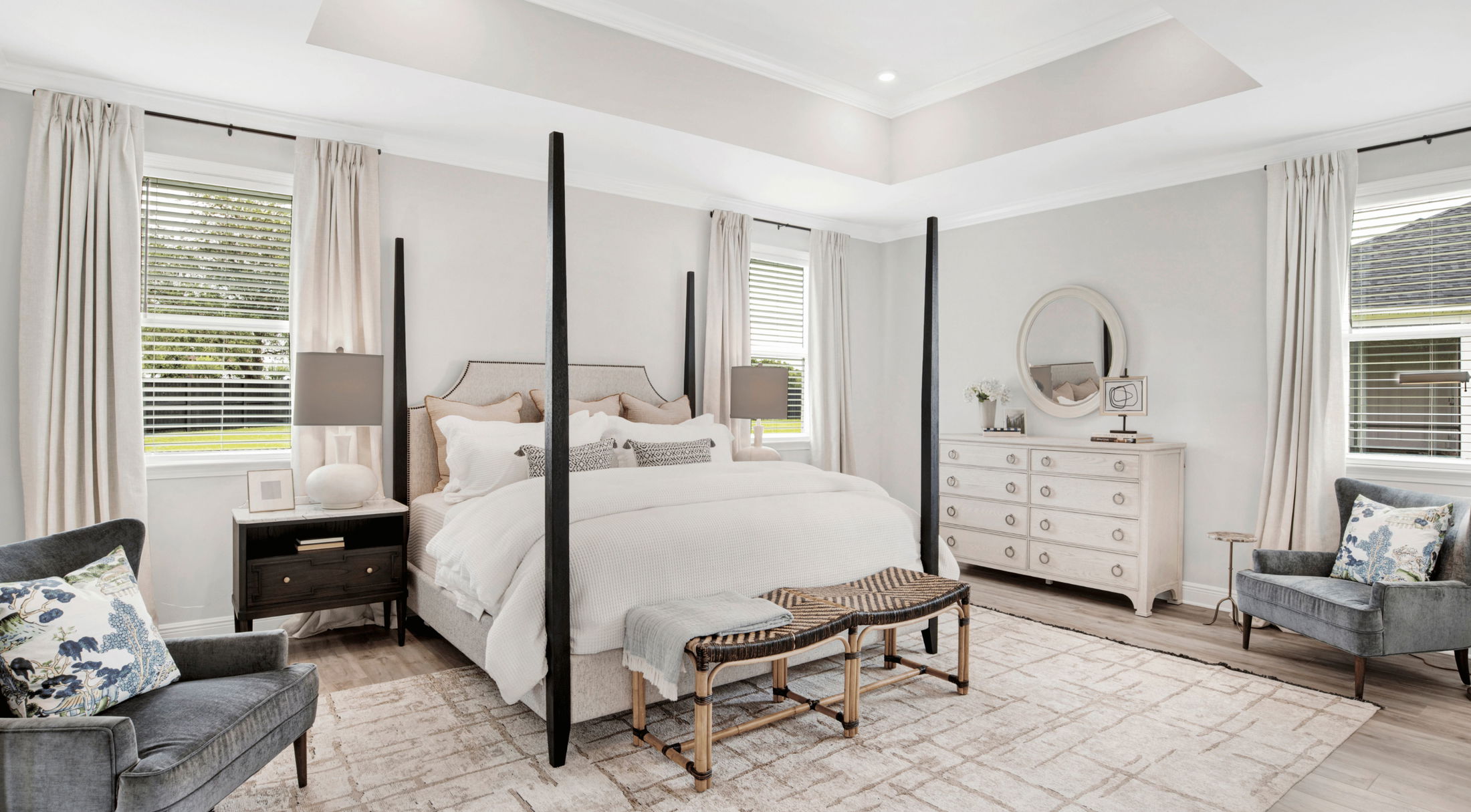 master bedroom with neutral decor in a new home in grant-valkaria, fl