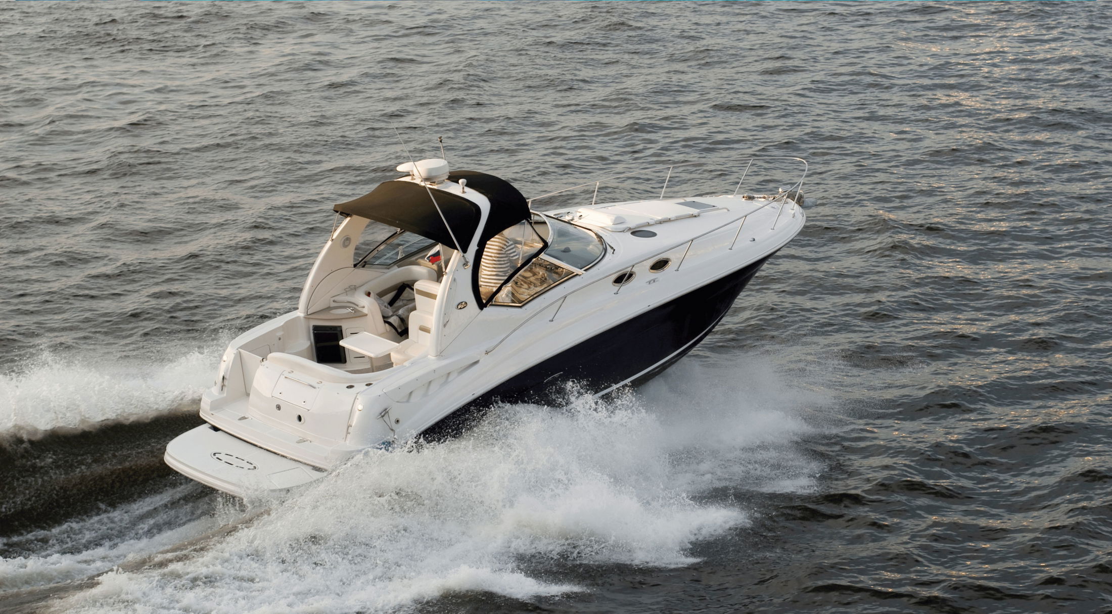 a motor boat on the water at sebastian inlet state park