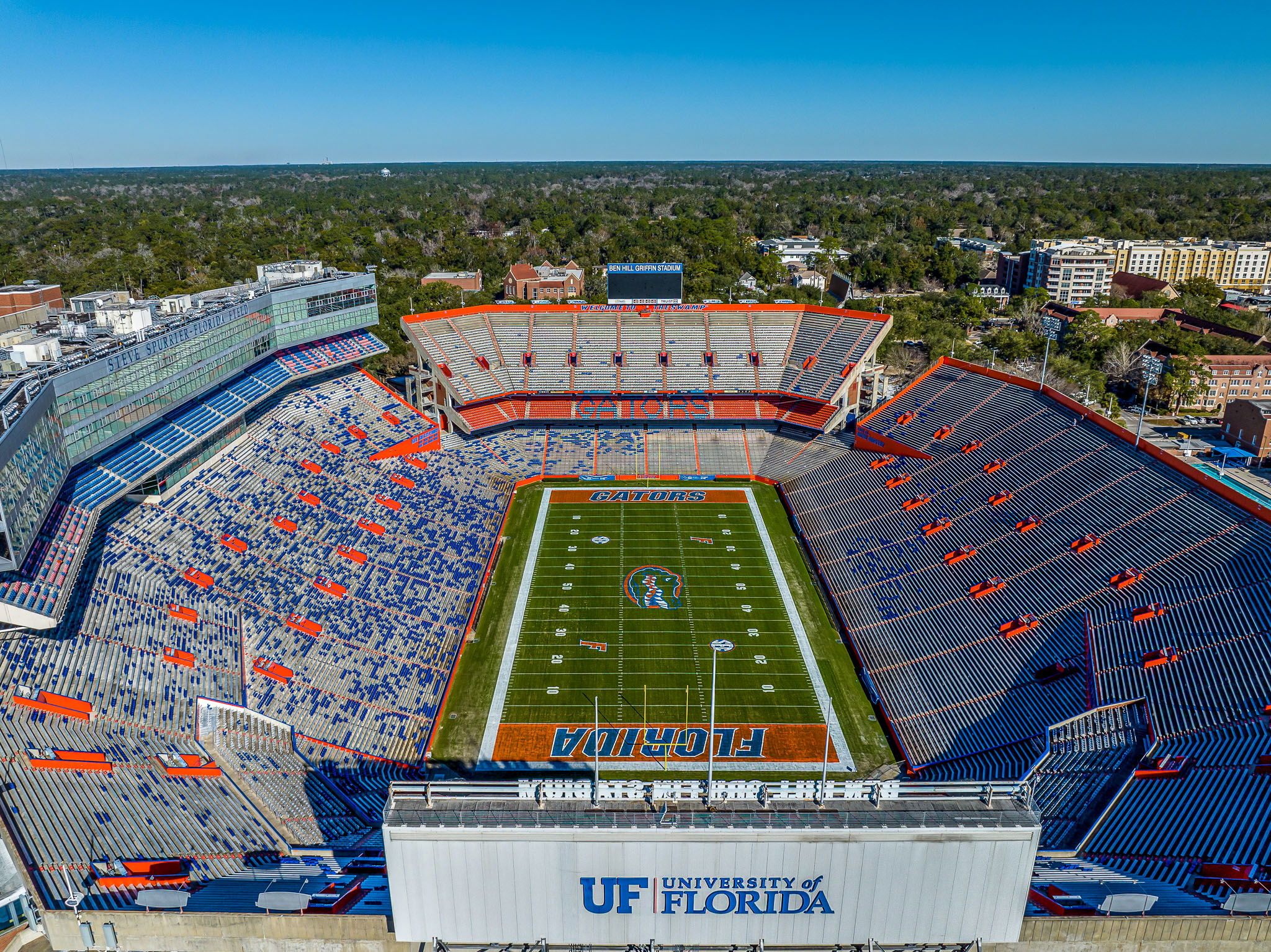 Aerial view of the University of Florida\\\\\\\\\\\\\\\'s Ben Hill Griffin Stadium, featuring the iconic Gators logo on the field.