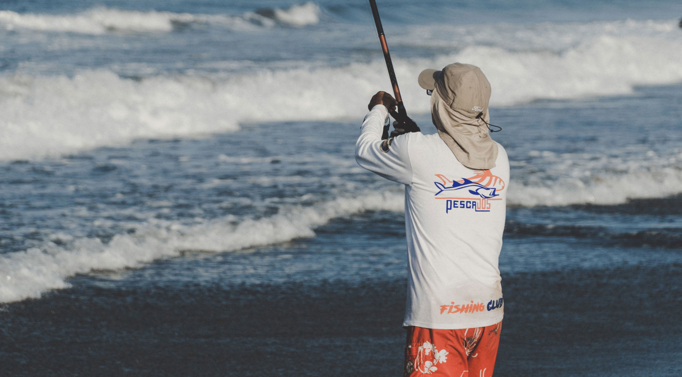 A person wearing a hat and a white \