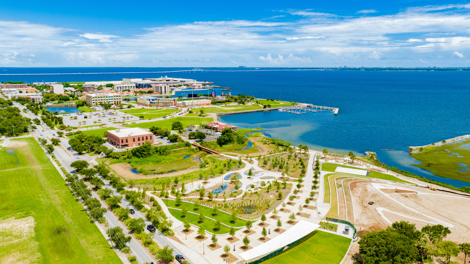 Aerial view of Pensacola's Community Maritime Park and waterfront area on a sunny day.