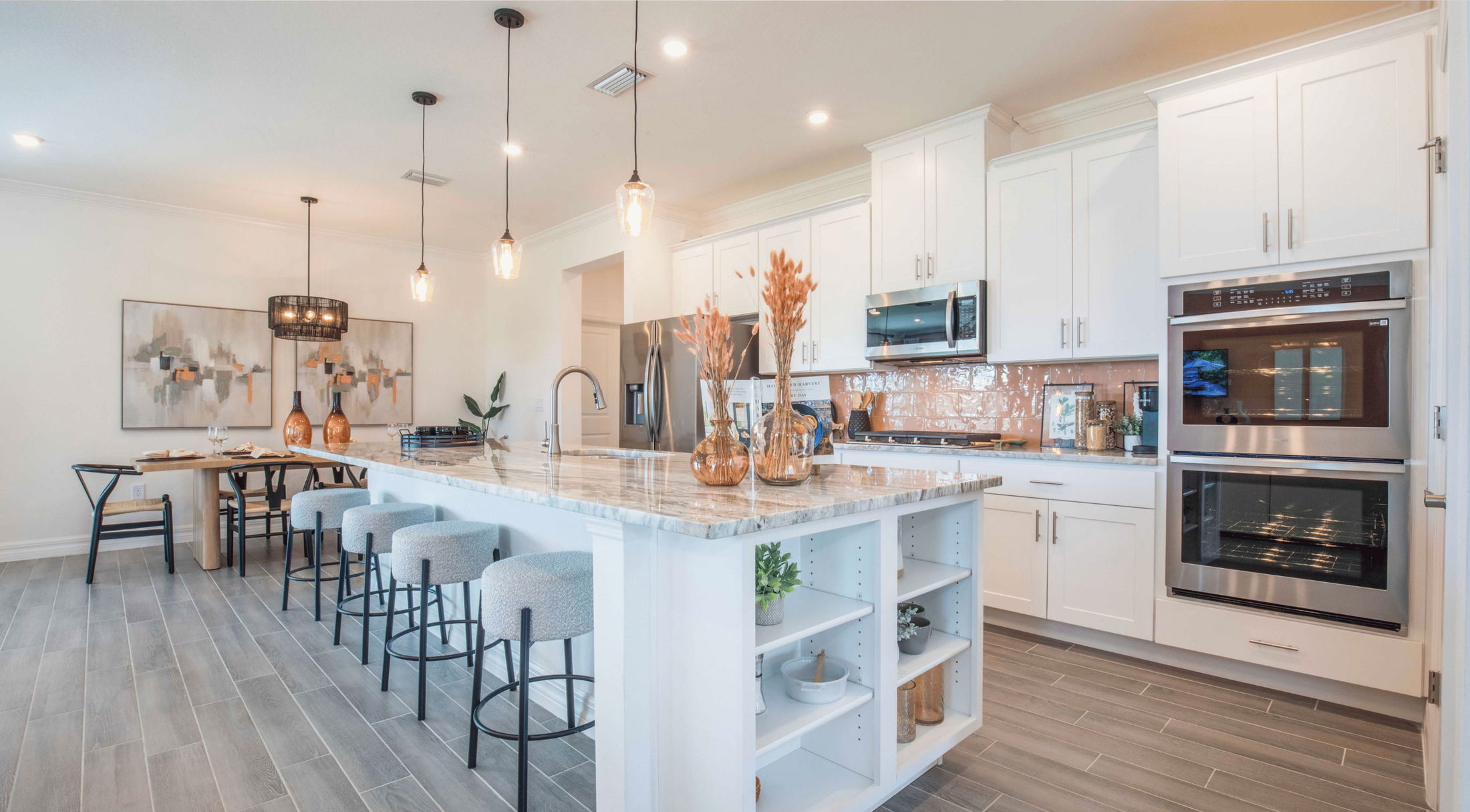 galley style white kitchen in a new home in pensacola, fl