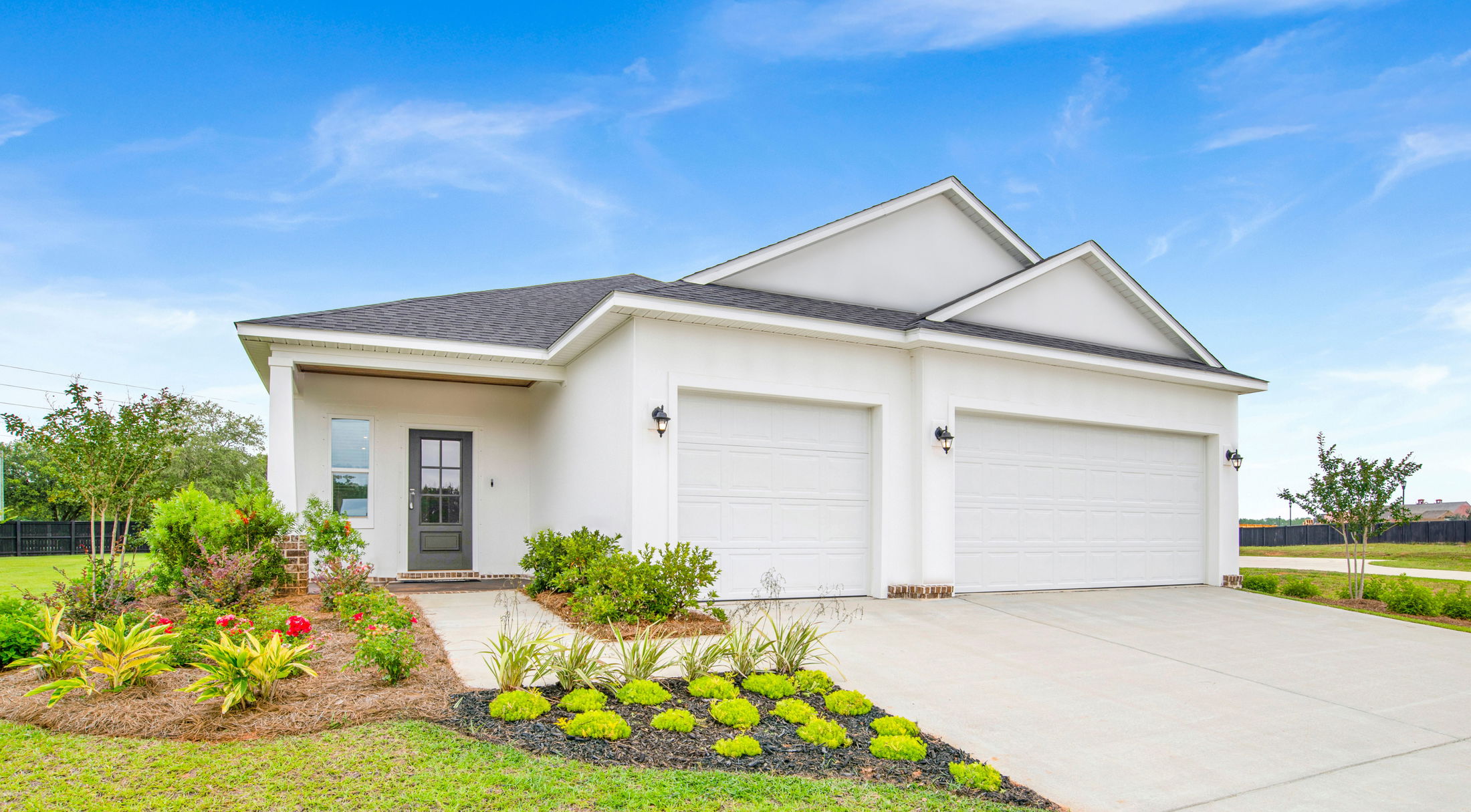 white and black 1 store home in pensacola, fl