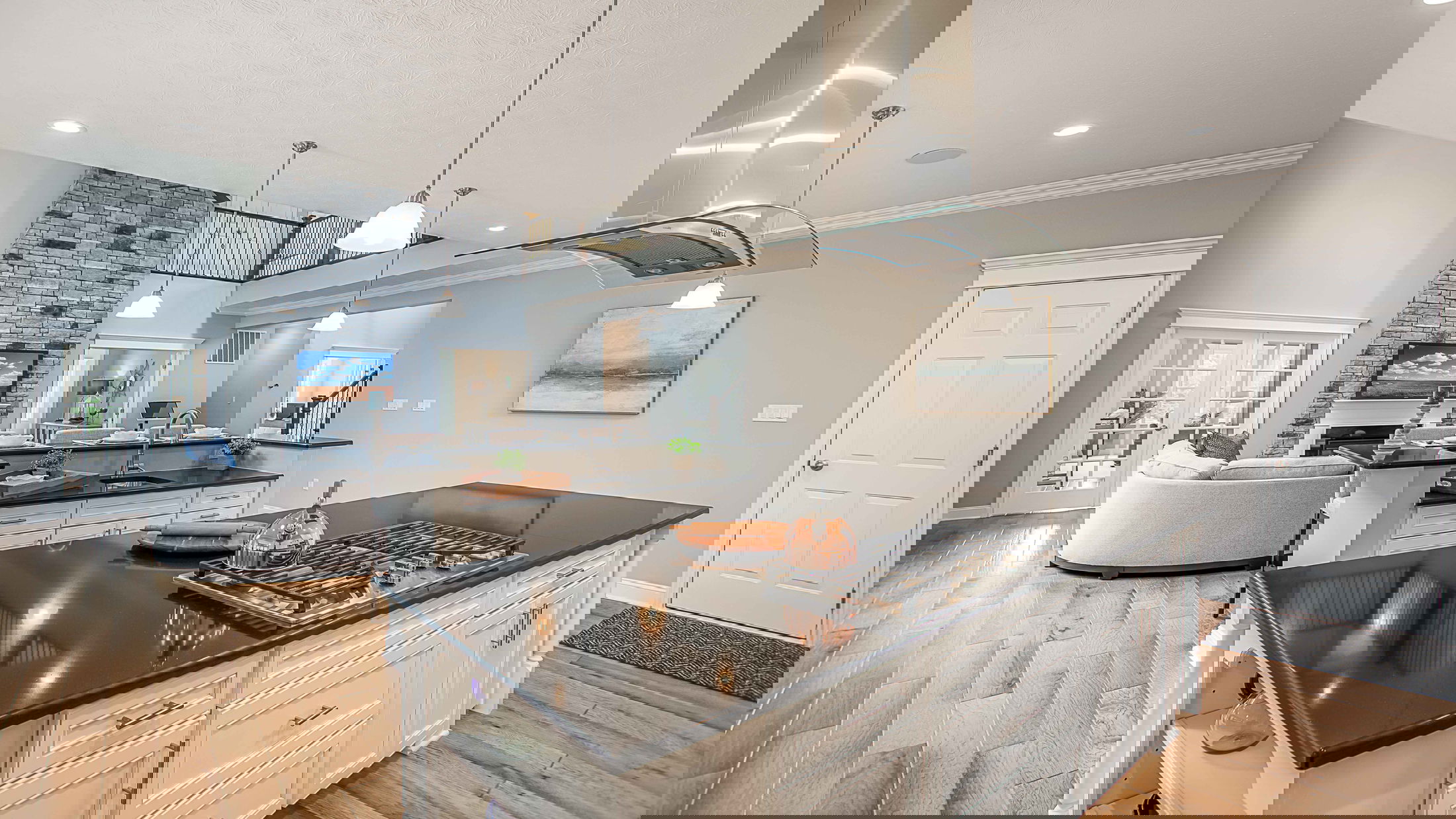 Glitchy digital image with horizontal color stripes in shades of blue, green, yellow, and pink creating an abstract pattern.