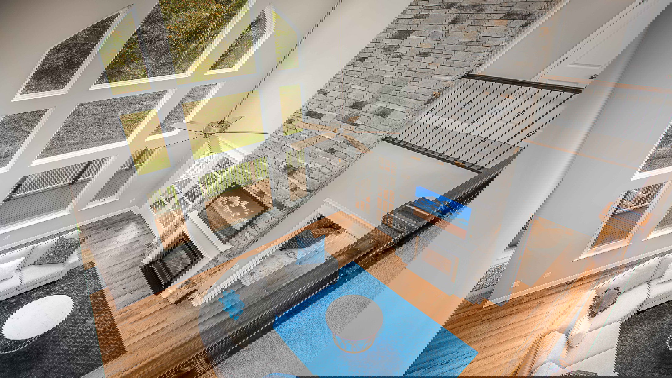 A vibrant abstract image featuring horizontal stripes in shades of blue, green, yellow, and black.