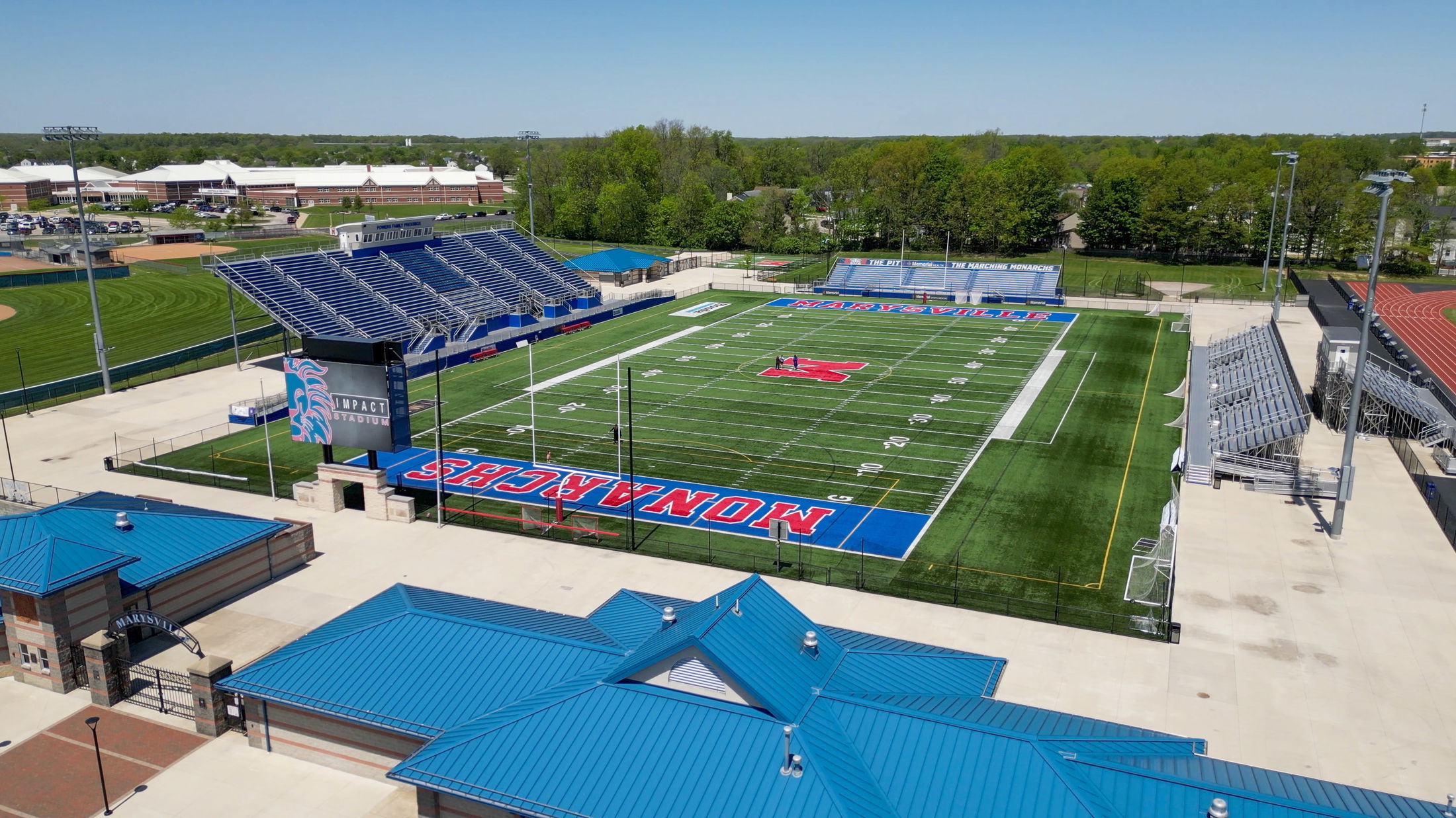 Aerial view of the blue-roofed Impact Stadium featuring a football field with \\\\\\\\\\\\\\\\\\\\\\\\\\\\\\\\\\\\\\\\\\\\\\\\\\\\\\\\\\\\\\\\\\\\\\\\\\\\\\\\\\\\\\\\\\\\\\\\\\\\\\\\\\\\\\\\\\\\\\\\\\\\\\\\\\\\\\\\\\\\\\\\\\\\\\\\\\\\\\\\\\\\\\\\\\\\\\\\\\\\\\\\\\\\\\\\\\\\\\\\\\\\\\\\\\\\\\\\\\\\\\\\\\\\\\\\\\\\\\\\\\\\\\\\\\\\\\\