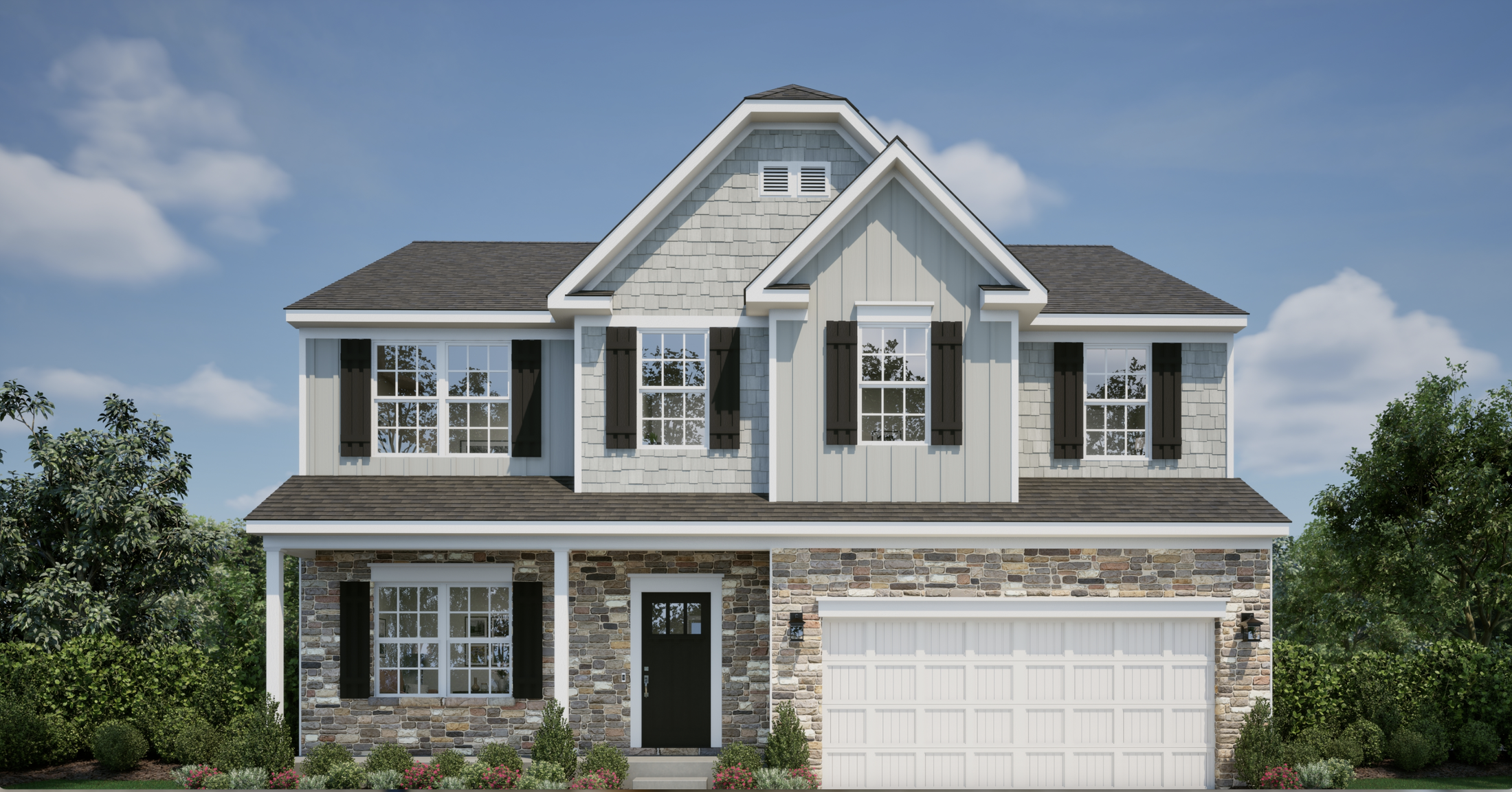 Two-story house with a stone facade, dark shutters, and a spacious garage in a landscaped setting under a blue sky.