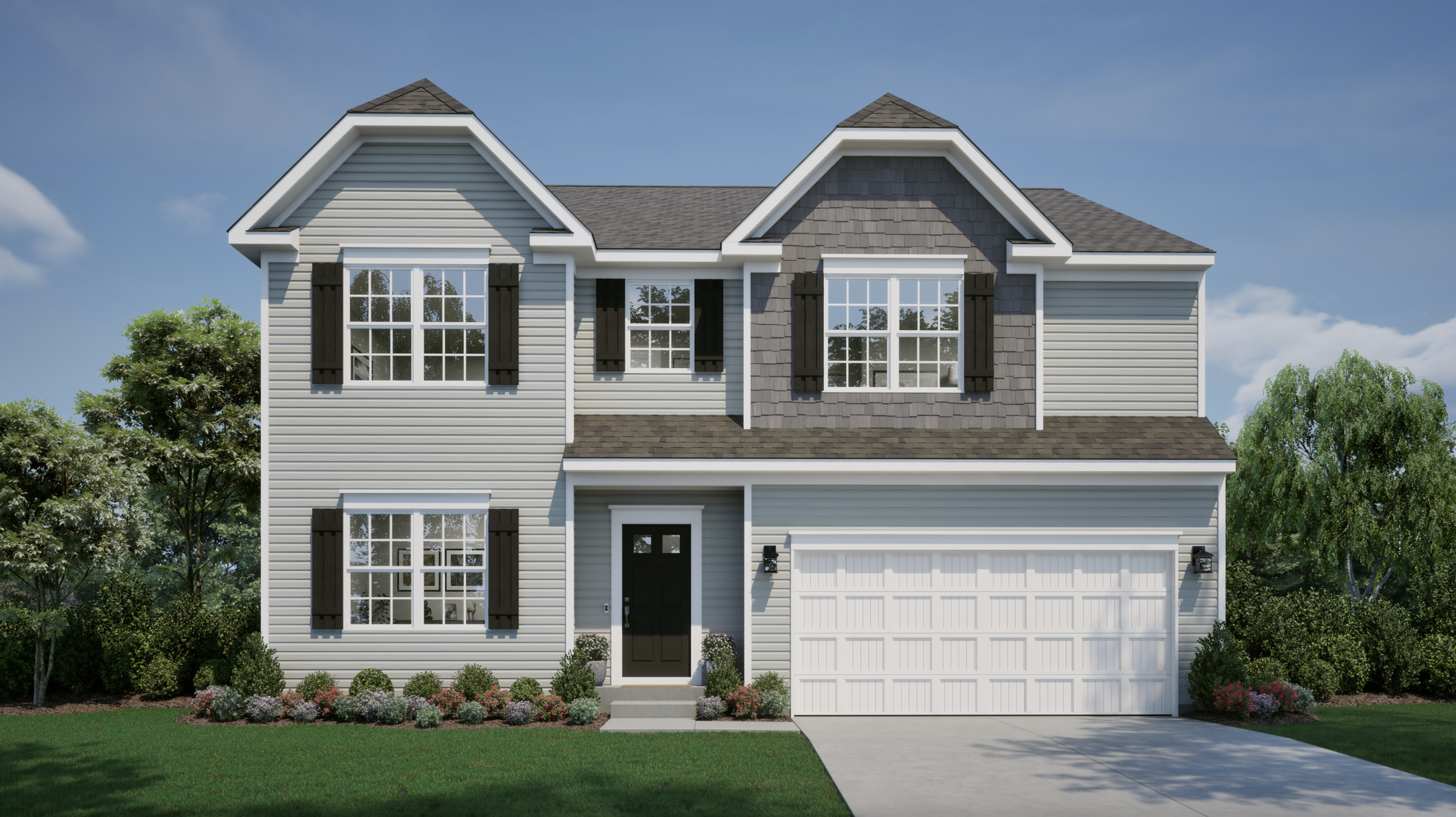 Modern two-story house with gray siding, black shutters, and a well-maintained front yard under a clear blue sky.