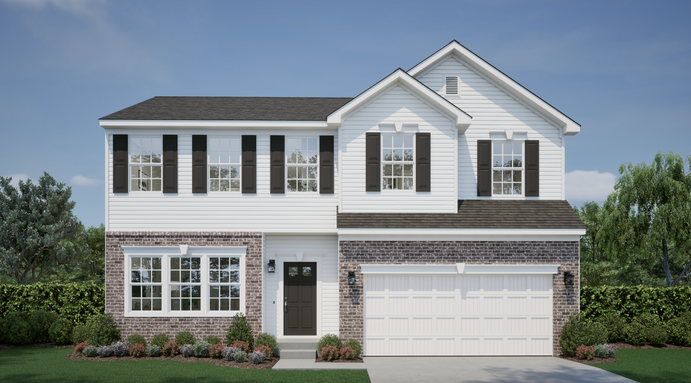Two-story suburban house with a classic white and brick facade, black shutters, and a double garage, surrounded by lush greenery.
