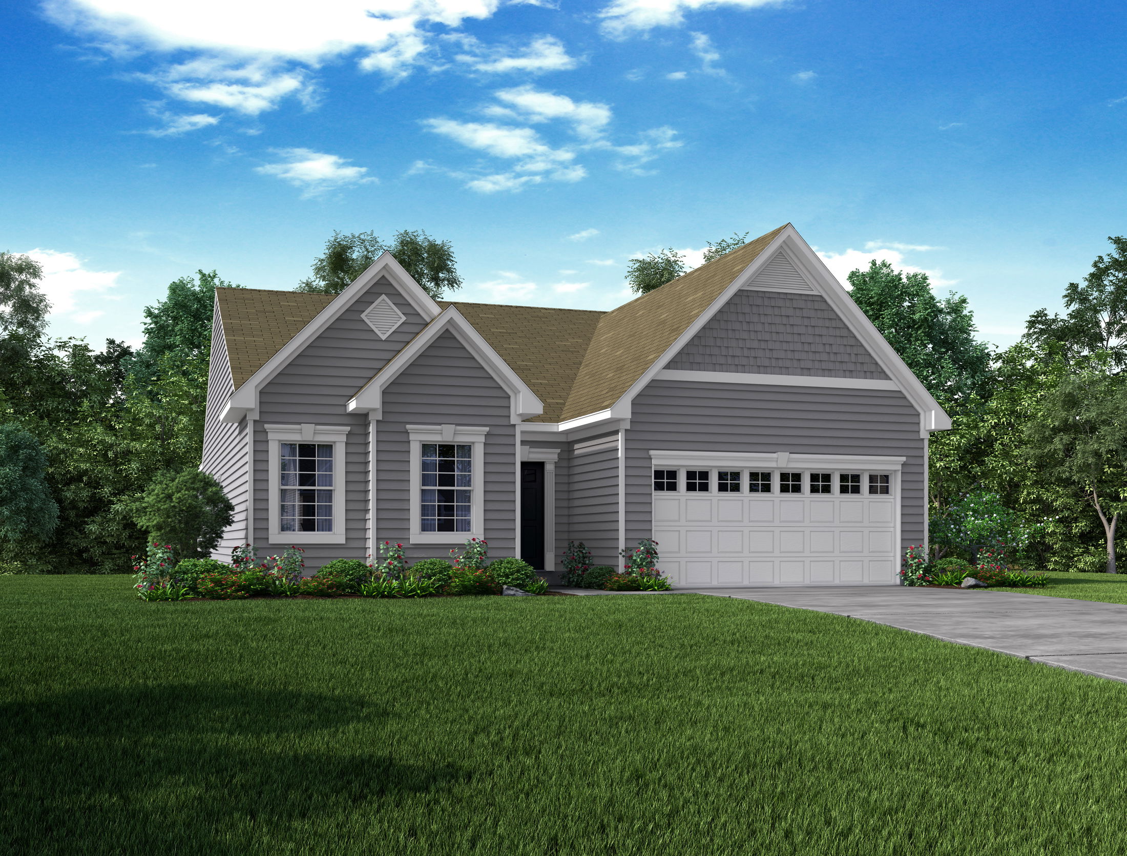 Front view of a modern, single-story grey house with a gabled roof, white trim, and a two-car garage, surrounded by a lush green lawn and garden.