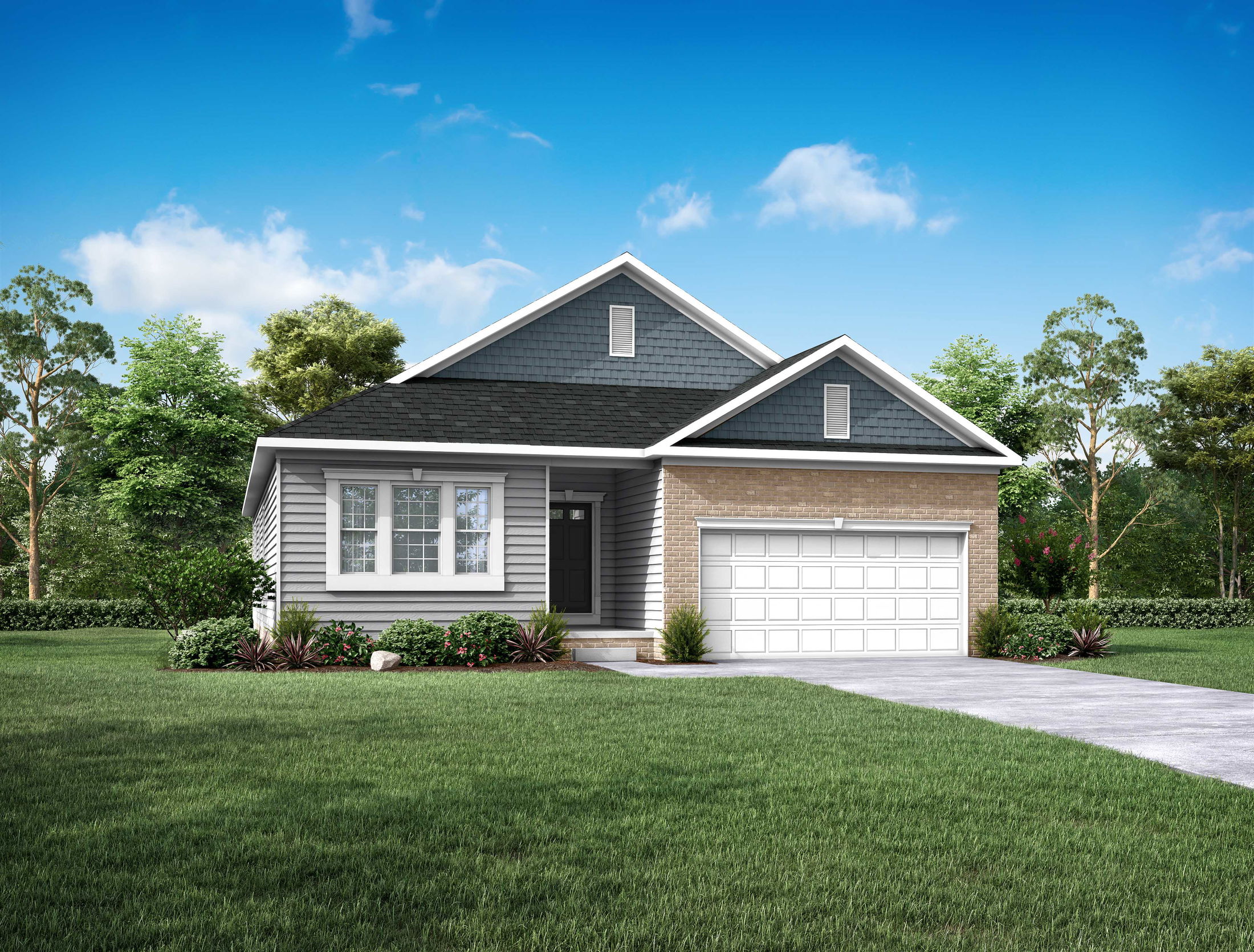 Modern suburban house with brick and vinyl siding, featuring a well-manicured lawn and a two-car garage under a clear blue sky.