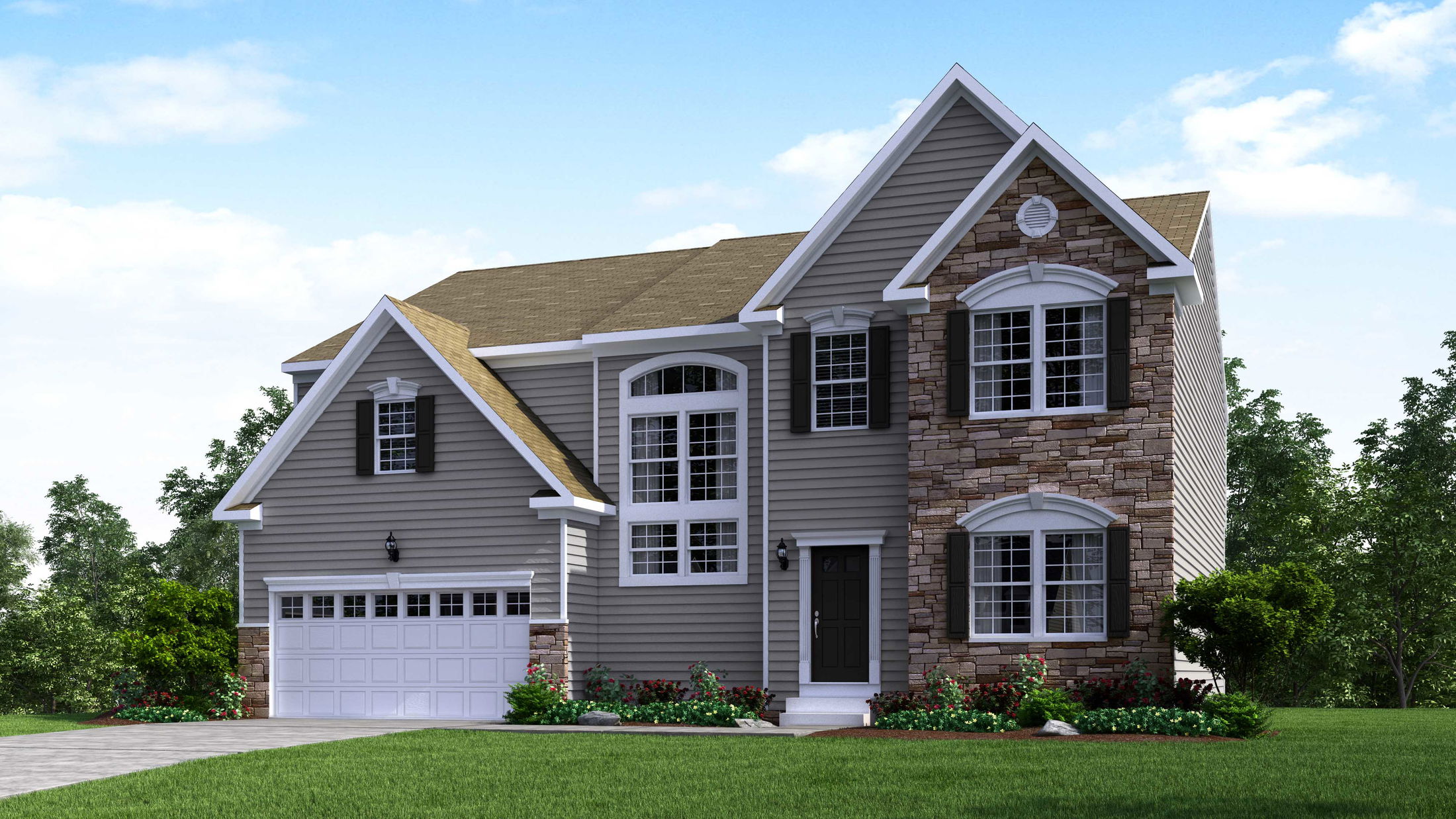 Beautiful two-story suburban home featuring gray siding, stone accents, and a spacious two-car garage.
