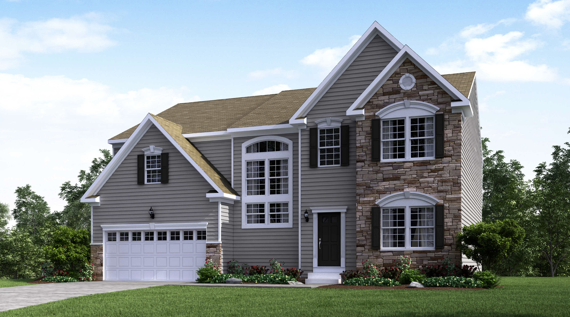 Modern two-story suburban house with gray siding, stone accents, and a two-car garage set against a clear blue sky.