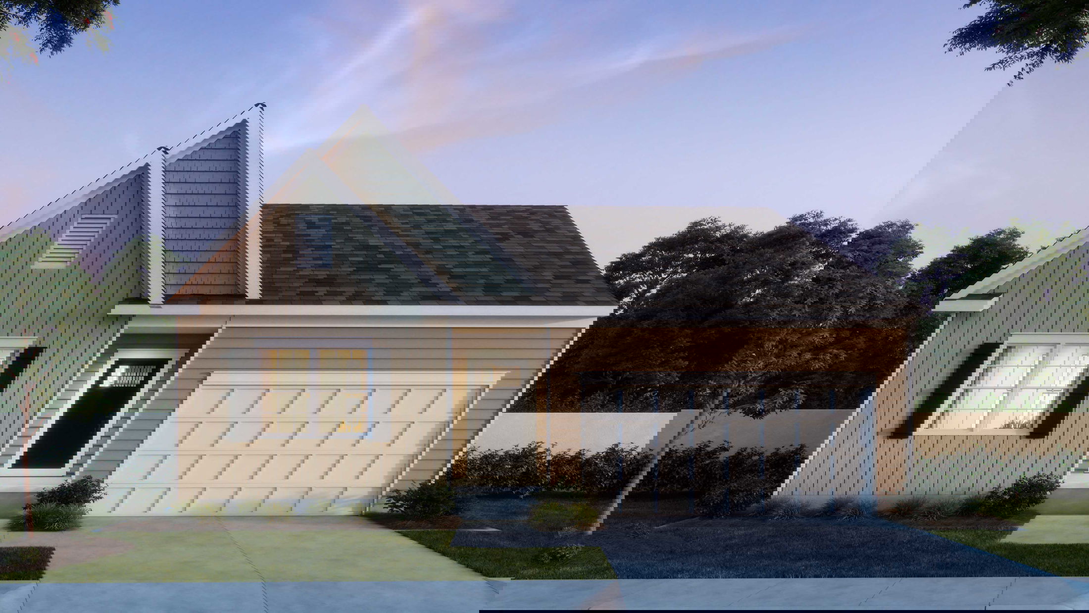 A man stands on a beach gazing at a vibrant ocean sunset under a clear sky.