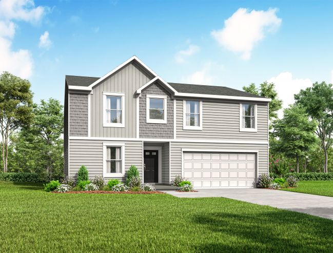 Modern two-story gray house with lush green lawn and attached garage under a clear blue sky.