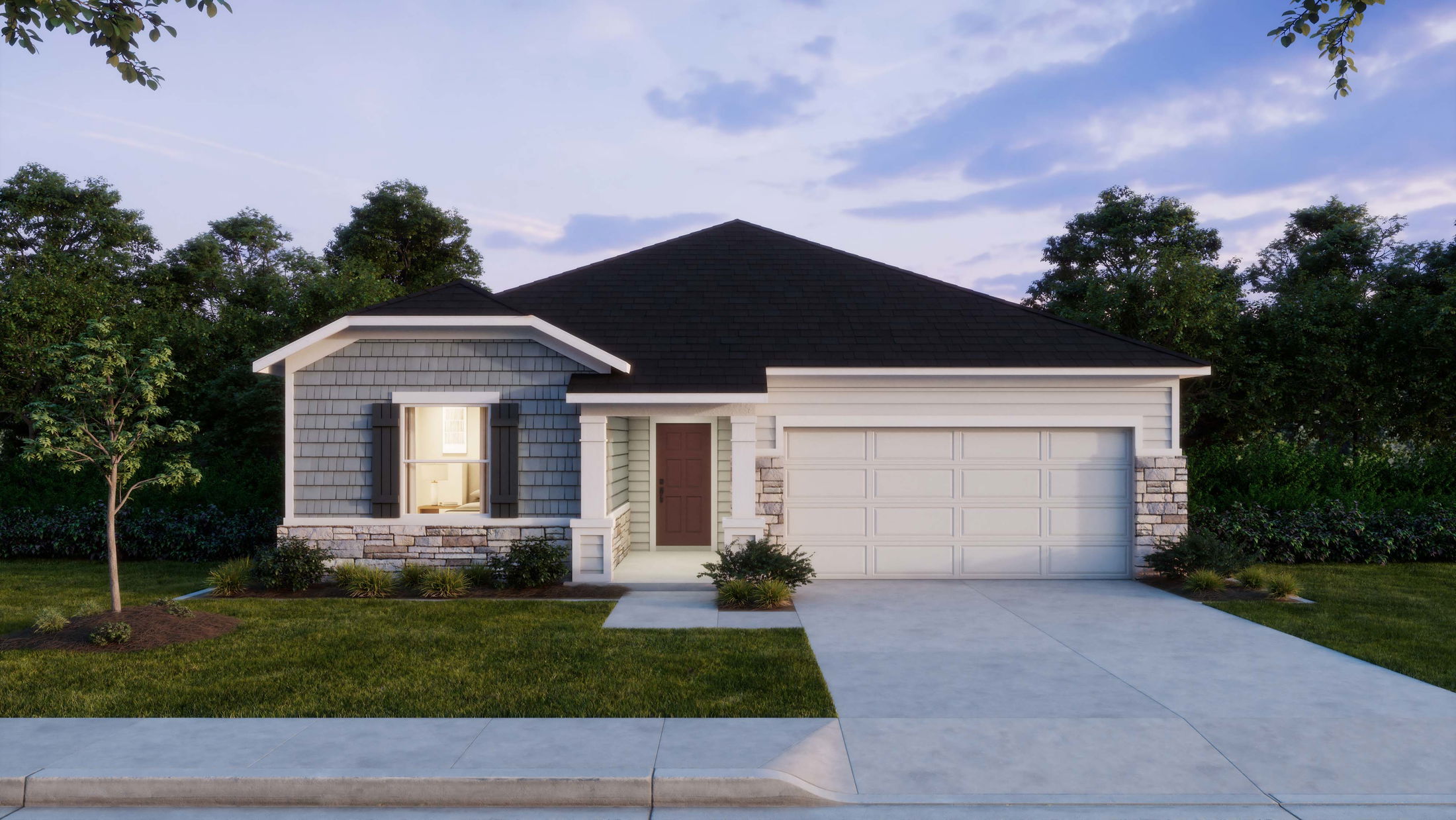 Single-story suburban home with a two-car garage, stone accents, and landscaped front yard.