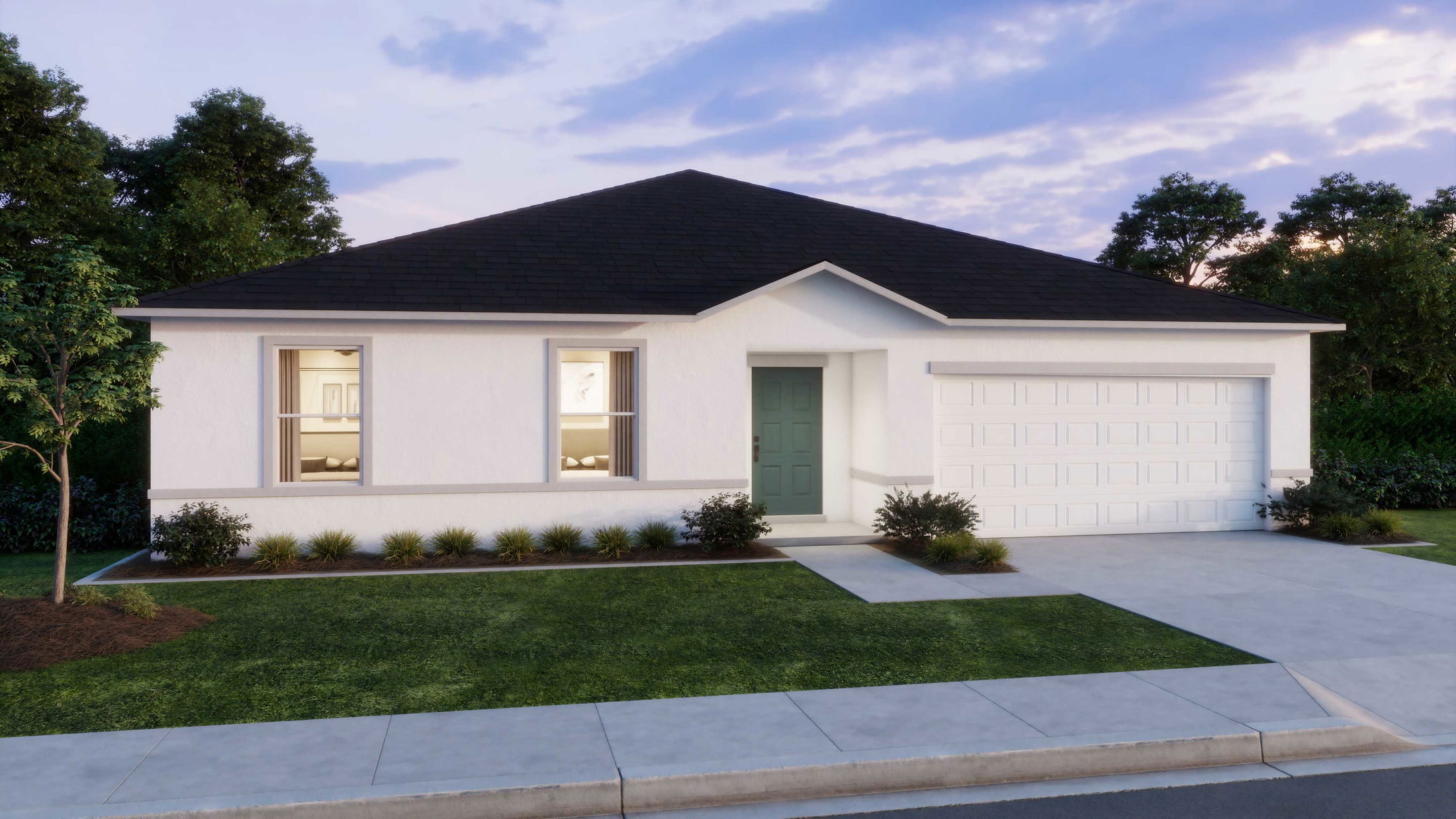 Modern single-story white house with lush green lawn and two-car garage at dusk.