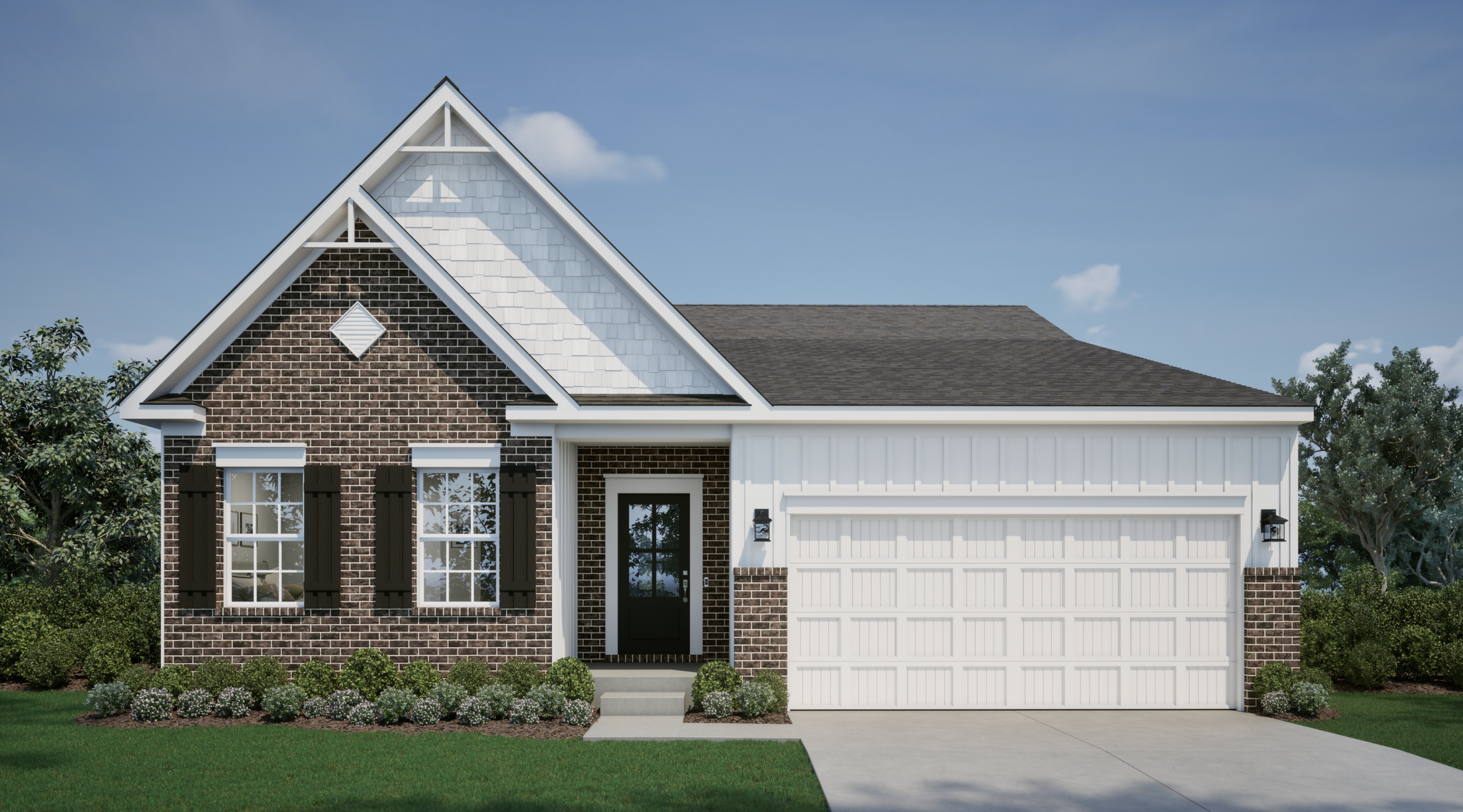 Single-story brick house with a gable roof, large white garage, and manicured lawn.