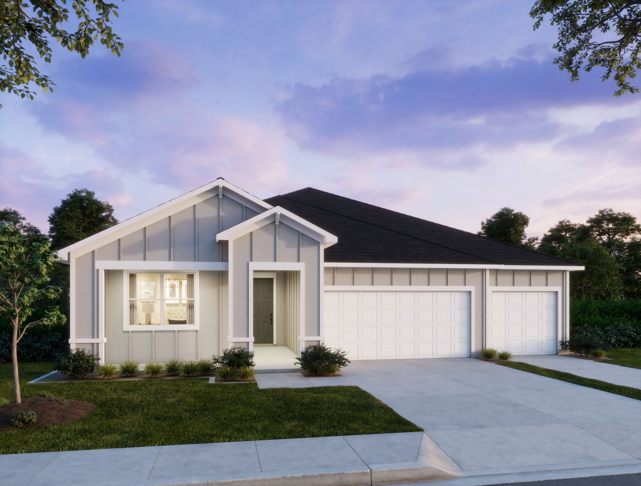 Modern single-story, gray and white house with a three-car garage and manicured lawn at sunset.