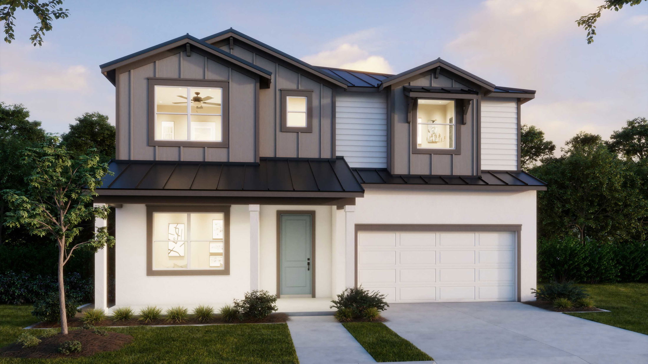 Modern two-story house with gray siding, large windows, and a manicured front yard.