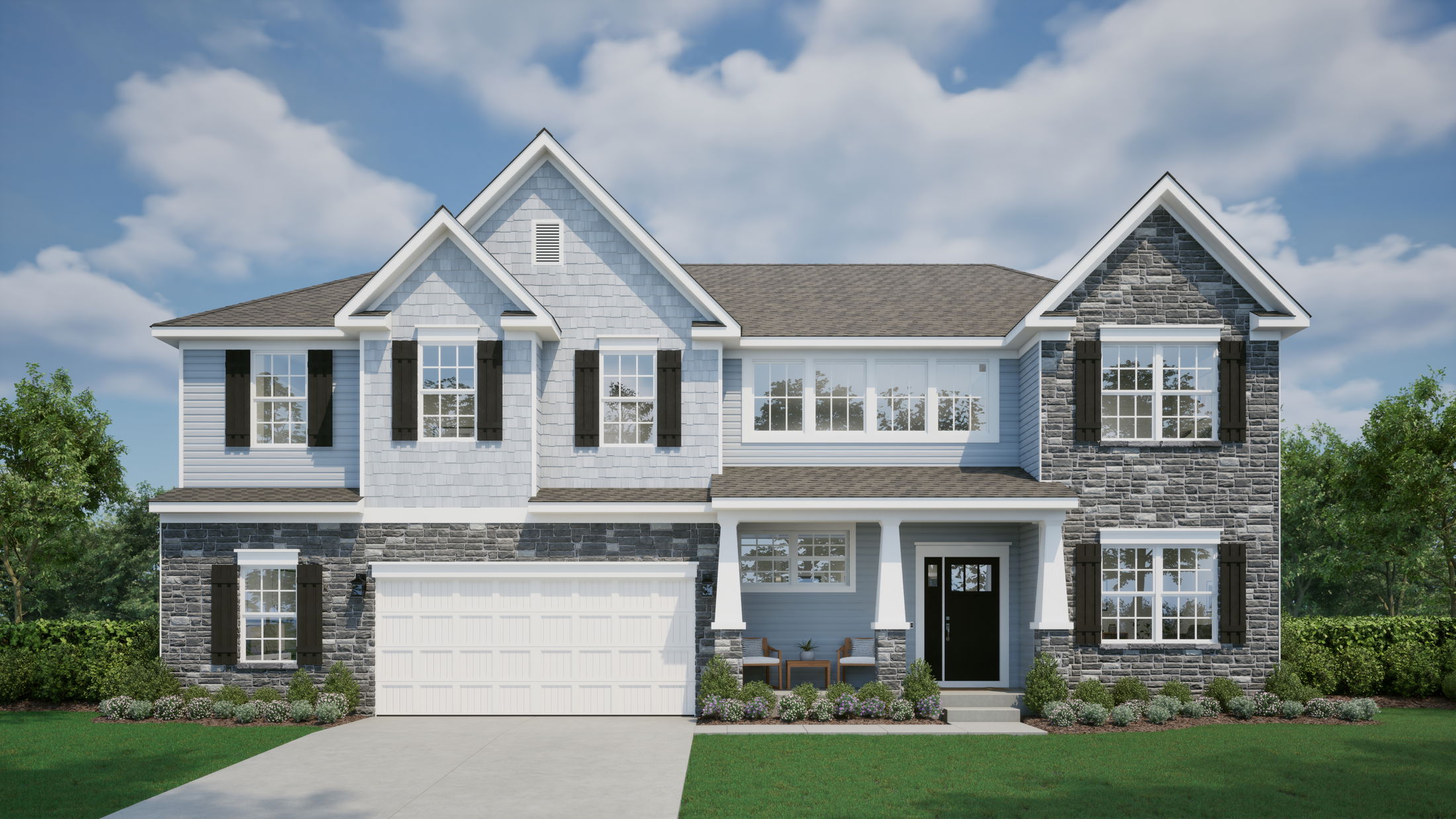 Two-story modern suburban home with stone and siding exterior, a manicured lawn, and a two-car garage.