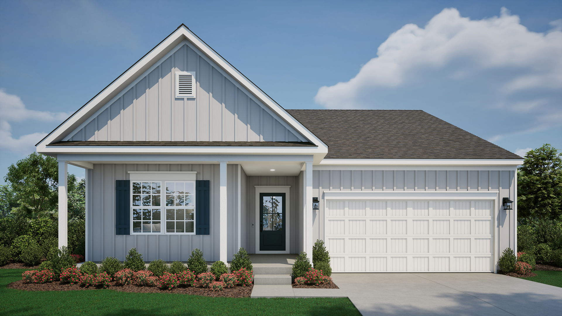 Modern single-story home with gray siding, a gable roof, and a double garage surrounded by manicured landscaping.