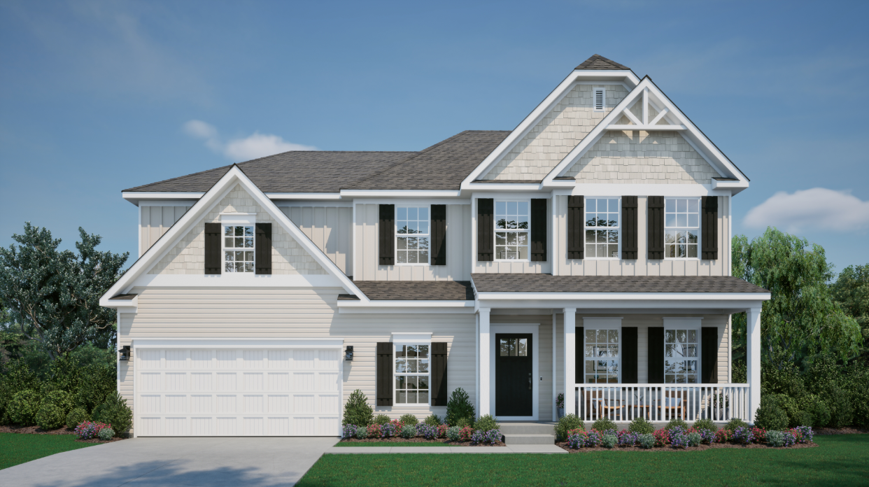 A beautiful, modern two-story suburban house with a front porch, dark shutters, and a well-maintained garden.