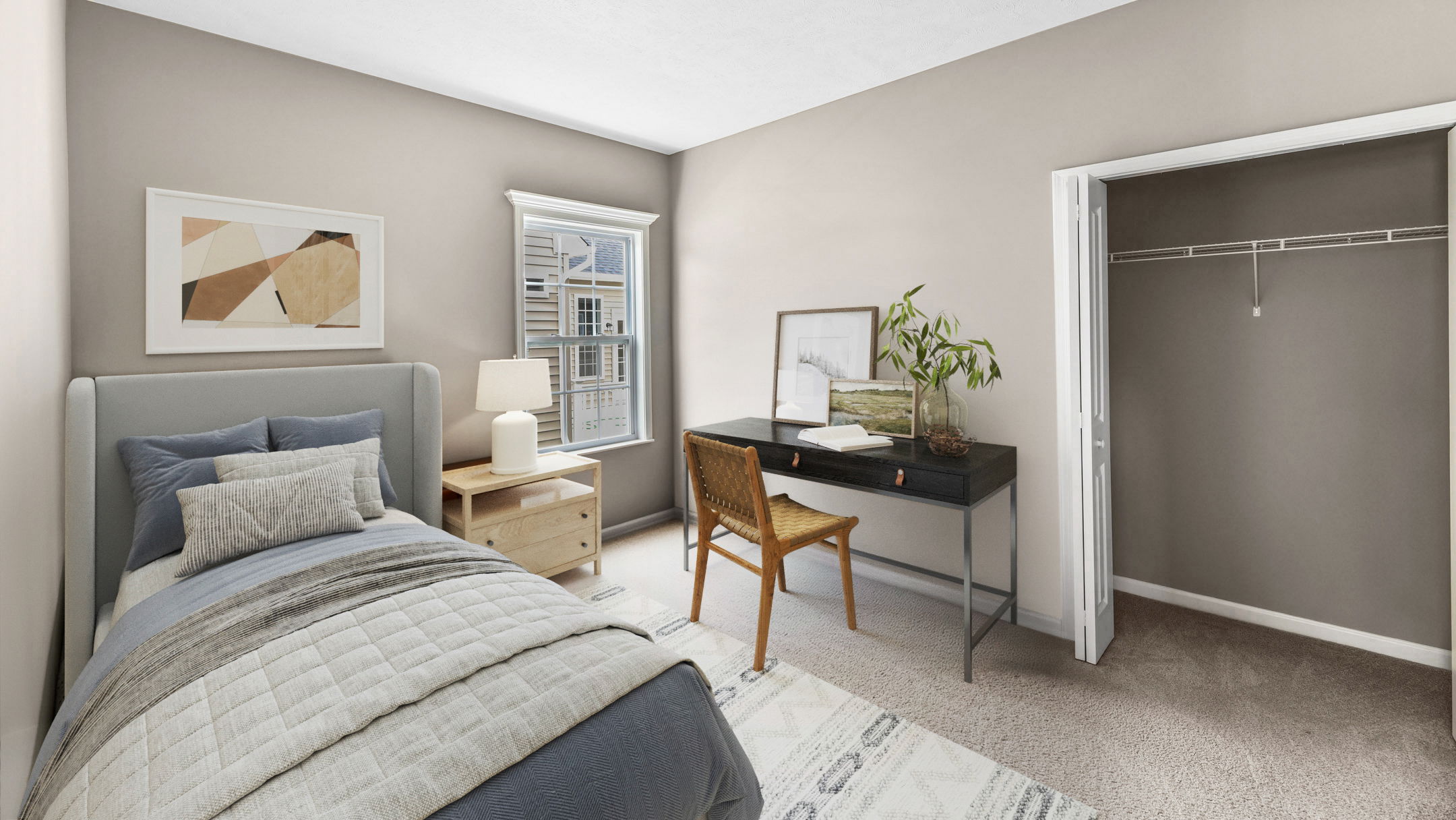 Modern bedroom with a cozy twin bed, stylish desk and chair, and contemporary decor.