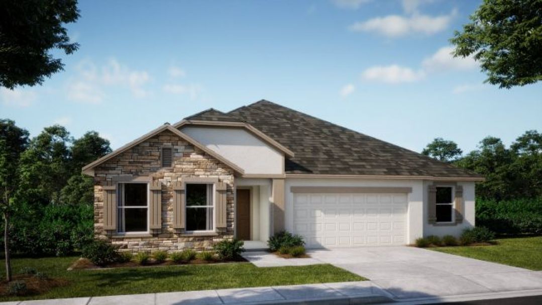 Single-story suburban house with stone and stucco exterior, featuring a two-car garage and well-manicured front yard.